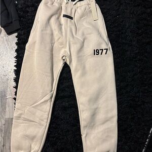 Fear of God Beige Joggers with 1977 Print